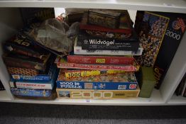 A shelf of mixed vintage Jig-saws including Waddington, MB, Victory, Falcon Star Patrol, all card