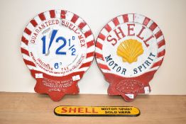 Three Shell signs two shell shaped and a Shell Motor Spirit sold here