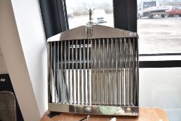 A Rolls Royce radiator grill and Spirit of Ecstasy car mascot