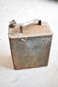 A vintage Shell Mex fuel can with brass cap