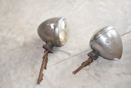 A pair of vintage Lucus spot lights