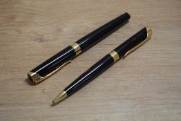 A Waterman L'Etalon converter fill fountain pen and ballpoint pen in Black Laque having Waterman