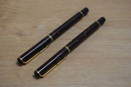 A Parker Rialto converter fill fountain pen and rollerball pen in Laque Lava