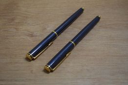 Two Waterman Maestro cartridge Converter fill fountain pens in Metallic Blue having Waterman