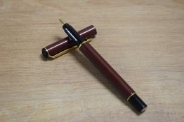 A Parker Rialto converter fill fountain pen in Metallic Maroon