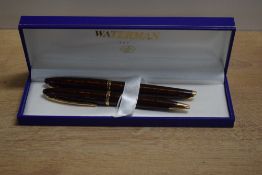 A boxed Waterman Carene converter cartridge fountain pen and ballpoint pen set in Amber Laque the