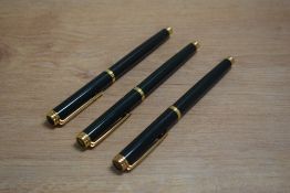 Two Waterman Gentleman cartridge converter fill fountain pens and a rollerball pen in Green Laque