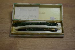 A boxed Conway Stewart 14 lever fill fountain pen and propelling pencil set in Green Marble the
