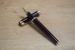 A Waterman L'Etalon converter fill fountain pen in Red Laque having Waterman Paris 18k 750 nib