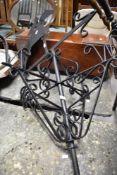 A wrought iron weather vane , with racehorse finial
