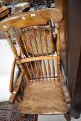 A 19th Century low seat spindle back armchair