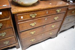 A 19th Century oak chest of four long drawers, the top drawer of shallow design, width approx. 84cm