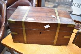 A 19th Century mahogany and brass box/caddy with two compartments to interior, width approx. 36cm