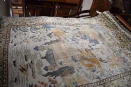 An Oriental silk based wall rug, with brass rail, approx. 108 x 78cm