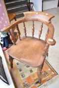 A traditional elbow chair having turned frame and double stretcher