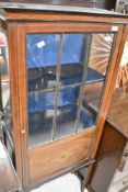 An Edwardian mahogany and inlaid narrow display cabinet, dimensions approx. Height 140cm