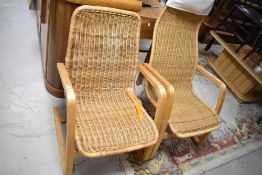 Two wicker easy chairs