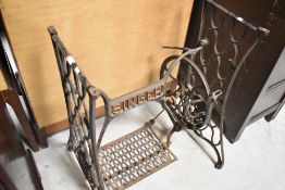 A vintage metal singer treadle sewing machine frame