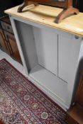 A modern part painted bookshelf, approx. width 84cm