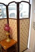 An Edwardian mahogany and inlaid trifold modesty screen