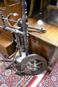 A traditional spinning wheel, as found, for spares or repair