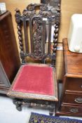 A 19th Century oak Carolean style hall chair