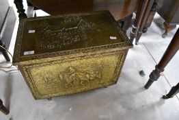 A brass slipper box