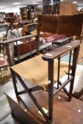 A stained frame folding directors chair