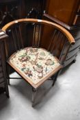 An Edwardian mahogany and inlaid corner chair