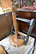 A stained frame standard lamp and folding table frame