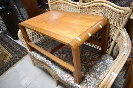 A vintage teak coffee table in the mid century style, approx. 80 x 49cm