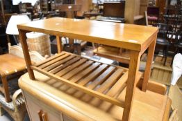 A traditional oak coffee table having slatted undertier, approx. 99 x 45cm