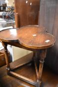 A traditional oak clover design occasional table