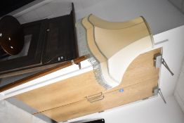 An early 20th Century oak standard lamp in the Art Deco style having stepped base