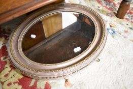 A classical style oval wall mirror, width approx. 63cm