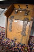 A Victorian oak coal purdonium (damage to liner)