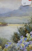 T M Hounsfield (20th Century) watercolour, depicting a landscape scene, within white mount, gilt and