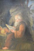 A 19th century oil on canvas, hermit reading, unsigned, within a moulded gilt wood and gesso