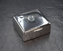 A Victorian silver cigarette box, of hinged square form having engraved 'CCI' monogram and wooden