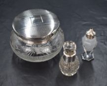 A George V silver capped cut glass powder bowl, having engine turned decoration to the lid, marks