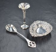 A Victorian silver bon bon dish, of slight pear form having decorative pierced scroll work to the