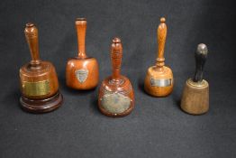 A group of five late 19th/ 20th century wooden presentation mallets, all of traditional form and