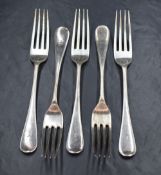A group of five Victorian silver Hanoverian pattern forks, having an initial engraved to the