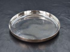 An Elizabeth II Scottish silver dish, of shallow circular form having raised sides, marks for