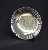 A George VI silver salver, of circular form having a lobed rim raised on a circular step moulded
