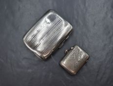 A George V silver cigarette case, of hinged rectangular form and slightly curved for the gentleman's