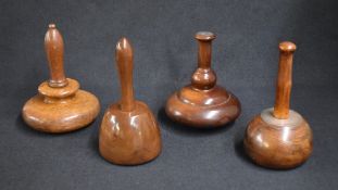A group of four large late 19th/ early 20th century wooden presentation mallets, all of