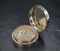 An Edwardian silver cased pocket barometer, of circular plain form, marks for London 1909, maker