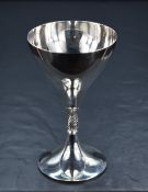 An Elizabeth II silver goblet, of traditional form raised on a knopped foliate stem and circular