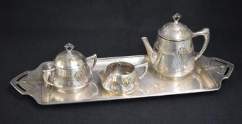 A Wurttembergische Metallwarenfabrik (WMF) Art Deco style three piece tea set, comprising tea pot,